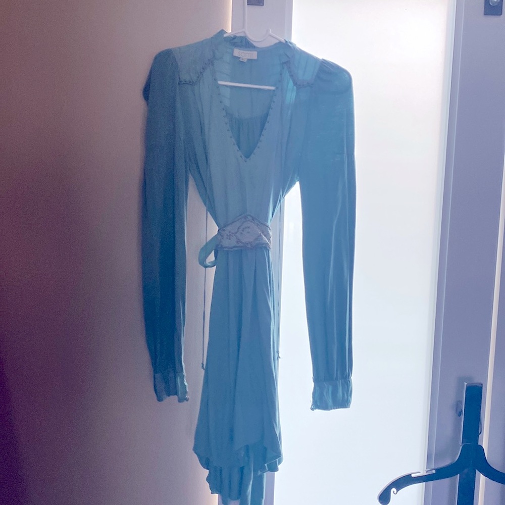 Somi unique and absolutely amazing dress. Used. Size 6. Beautiful teal color.